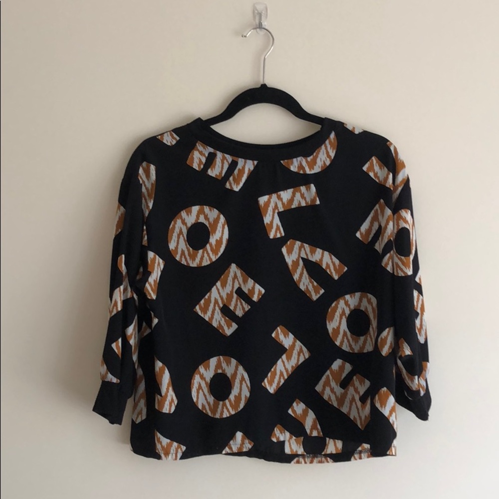 “Love” print top